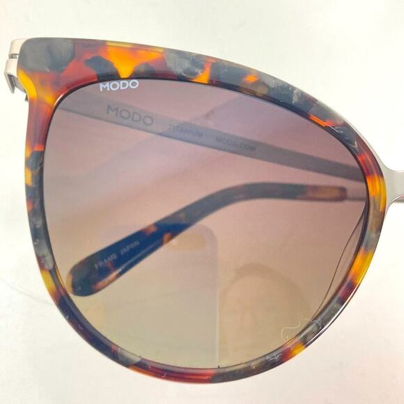 MODO 454 Titanium Polarized Tortoise Sunglasses - $257. main image 14